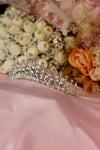 Silver crystal bridal tiara with large oval rhinestones and pavé detailing on pink satin — Feriha Bridal
